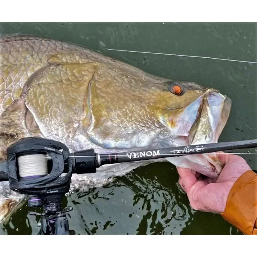 Wilson Venom Target Baitcast Rod boatside with barramundi