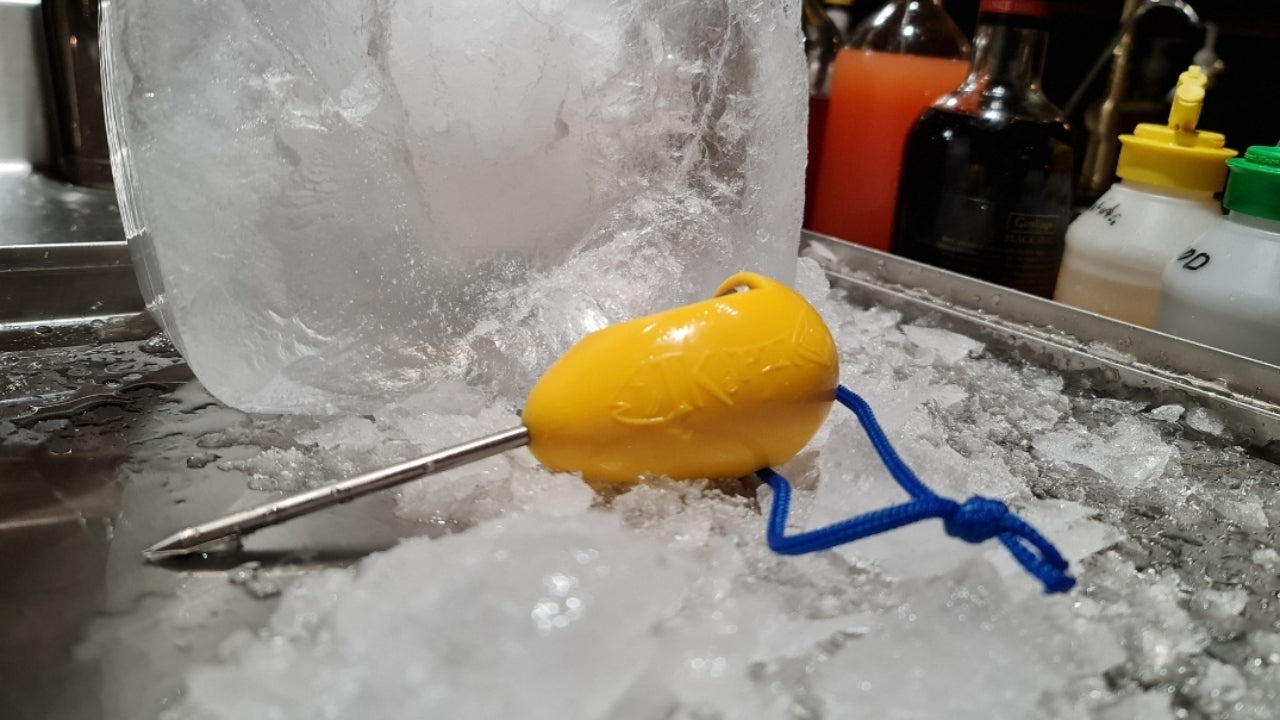 Ikipik fish spike being used as an ice pick