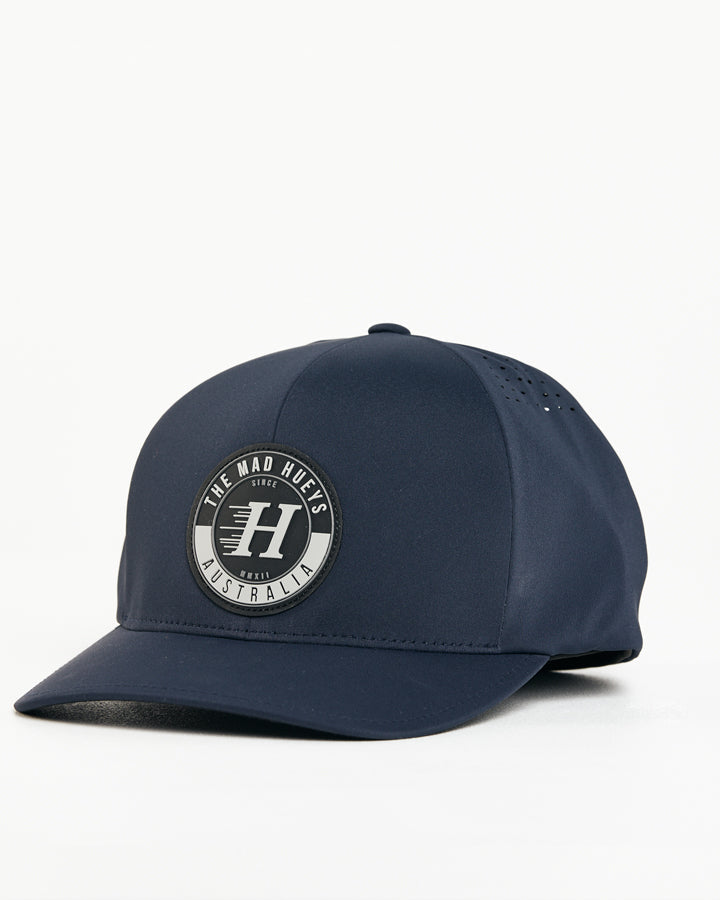 The Mad Hueys Flying H Delta Navy Flexfit Hat - H121M06012